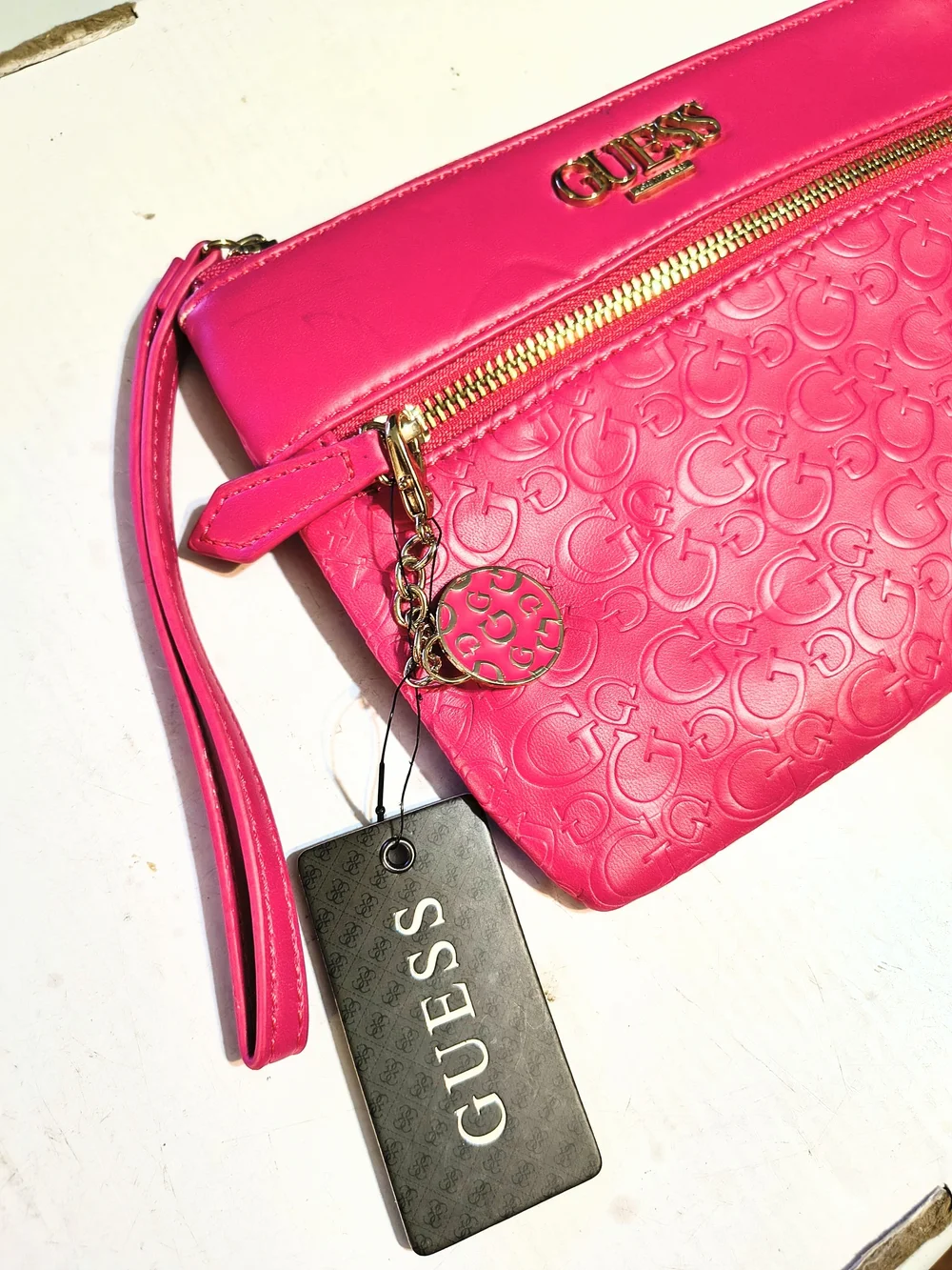 GUESS Hot Pink Embossed Logo Wristlet with Gold Hardware